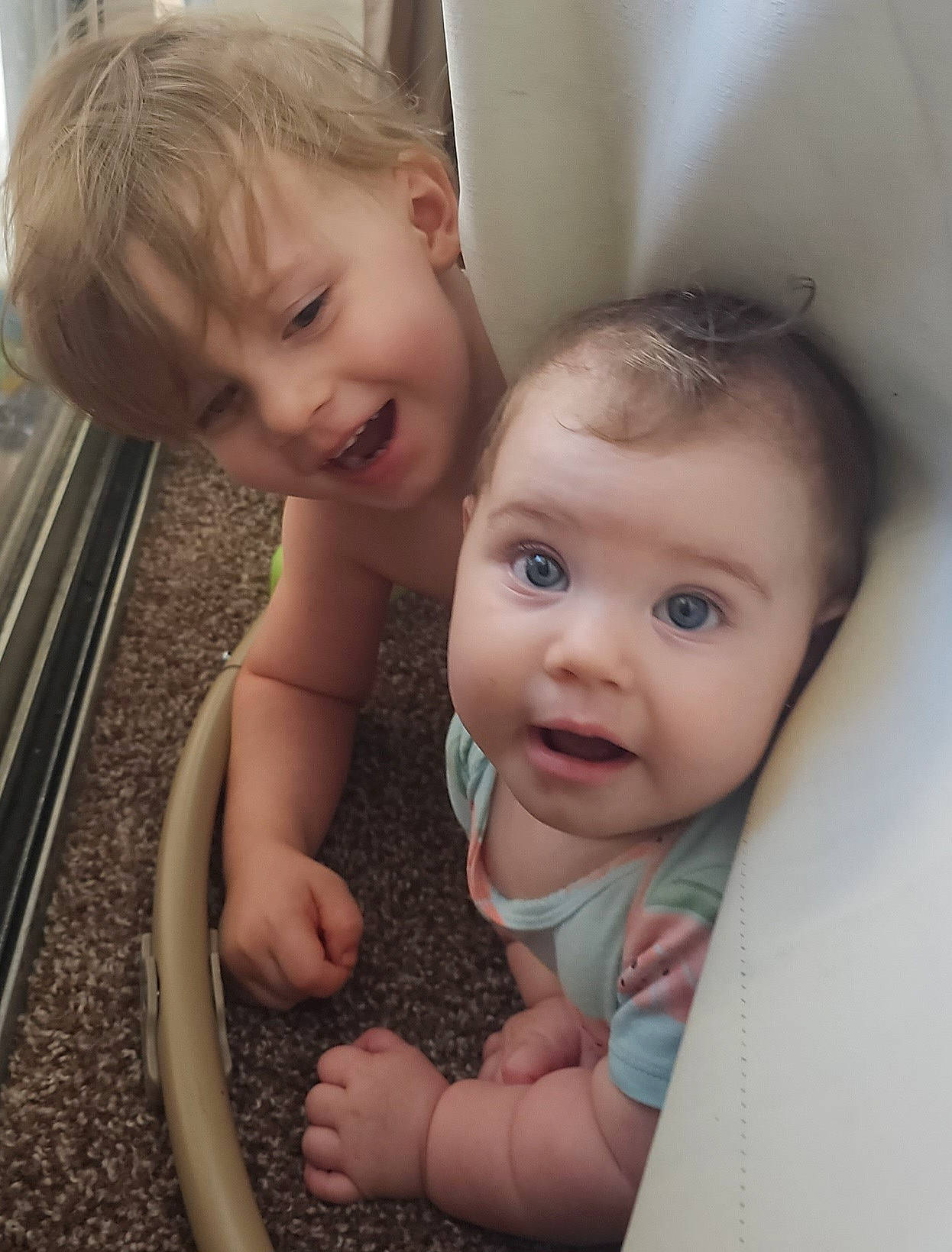 Kinsley is registered to the contest to win money with this photo: baby, baby_toddler_clothing, cheek, chin, eyebrow, finger, fun, gesture, hand, happy, human_body, iris, lip, mouth, nose, person, skin, smile, standing, surprise