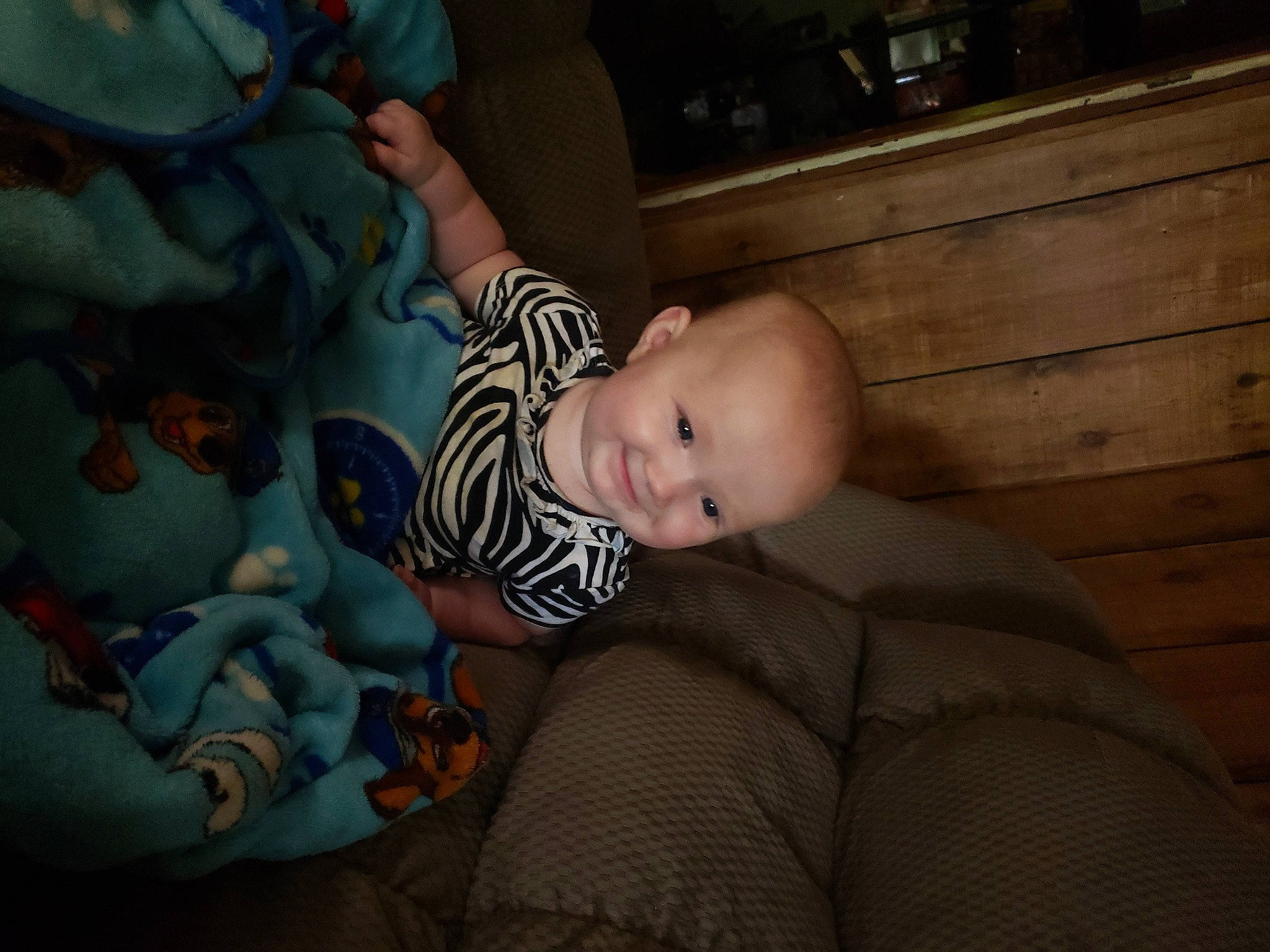 Esmeralda joined the competition — help win amazing prizes! baby, baby_products, baby_toddler_clothing, cheek, child, comfort, eye, flash_photography, flooring, fun, hardwood, joy, leg, linens, mouth, person, room, sitting, skin, smile