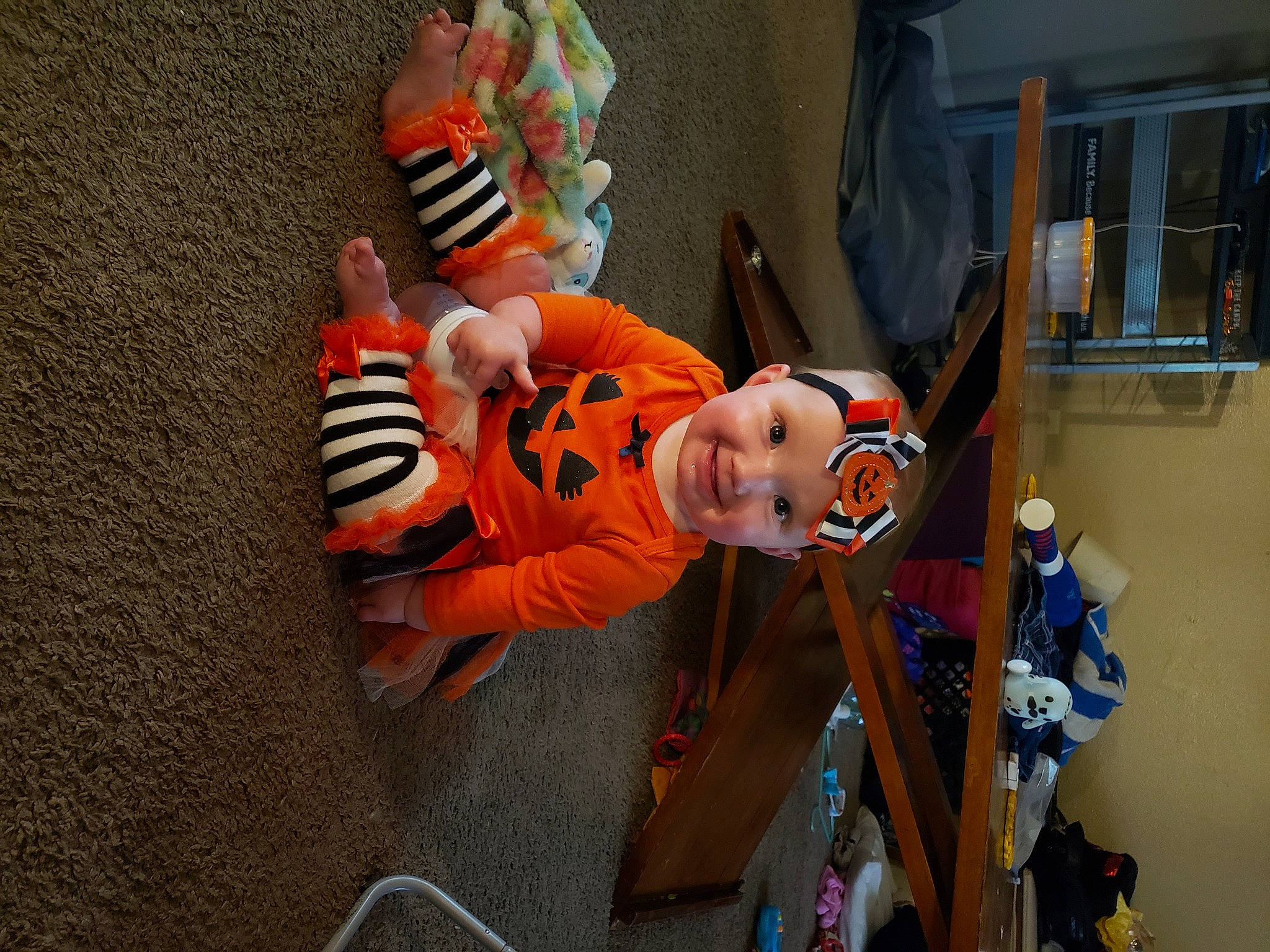 Esmeralda joined the competition — help win amazing prizes! animation, costume, door, event, fun, hat, headwear, joy, orange, person, plush, room, stuffed_toy, toddler, toy, trick_or_treat, window