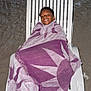child, smiling, towel, beach, sand, night, lounge_chair, plastic_chair, happy, wrapped, relaxing, outdoor, person, vacation, holiday, leisure, portrait, casual, fun, comfort