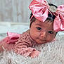 baby, infant, pink_bow, headband, lace, blanket, fluffy, cute, portrait, child, face, small_hand, lying_down, soft_texture, adorable, indoor, closeup, infant_clothing, baby_girl, young_child