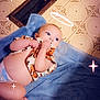 Willow joined the competition — help win amazing prizes! baby, blue_towel, child, cloth, cute, diaper, face, floor, foot, halo, hand, indoors, infant, lying_down, patterned_floor, playful, skin, sparkle_effect, tile, towel