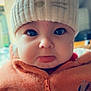 Emmy participe au concours pour gagner de l'argent avec cette photo : adorable, baby, baby_face, bear_ears, child, child_wearing_hat, closeup, cozy, cute, expression, face, hat, indoors, knit_hat, orange_jacket, portrait, tongue_out, warm_clothing, winter_clothing, young_child