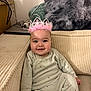 Emmy participe au concours pour gagner de l'argent avec cette photo : baby, blanket, cables, child, corduroy, couch, cute, furniture, happy, home, indoor, laptop, onesie, pillow, plush, portrait, seated, smile, soft, tiara