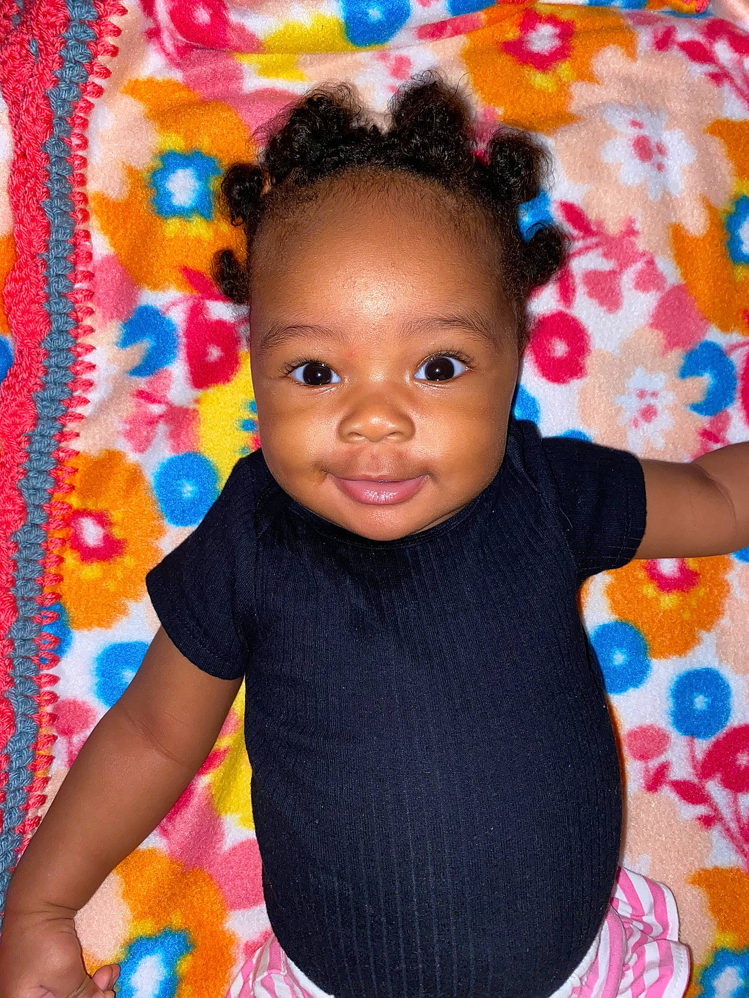 Alayna is registered to the contest to win money with this photo: baby_toddler_clothing, beauty, cheek, eye, eyelash, face, fun, happy, head, iris, lip, magenta, pattern, person, pink, skin, sleeve, smile, t_shirt, textile