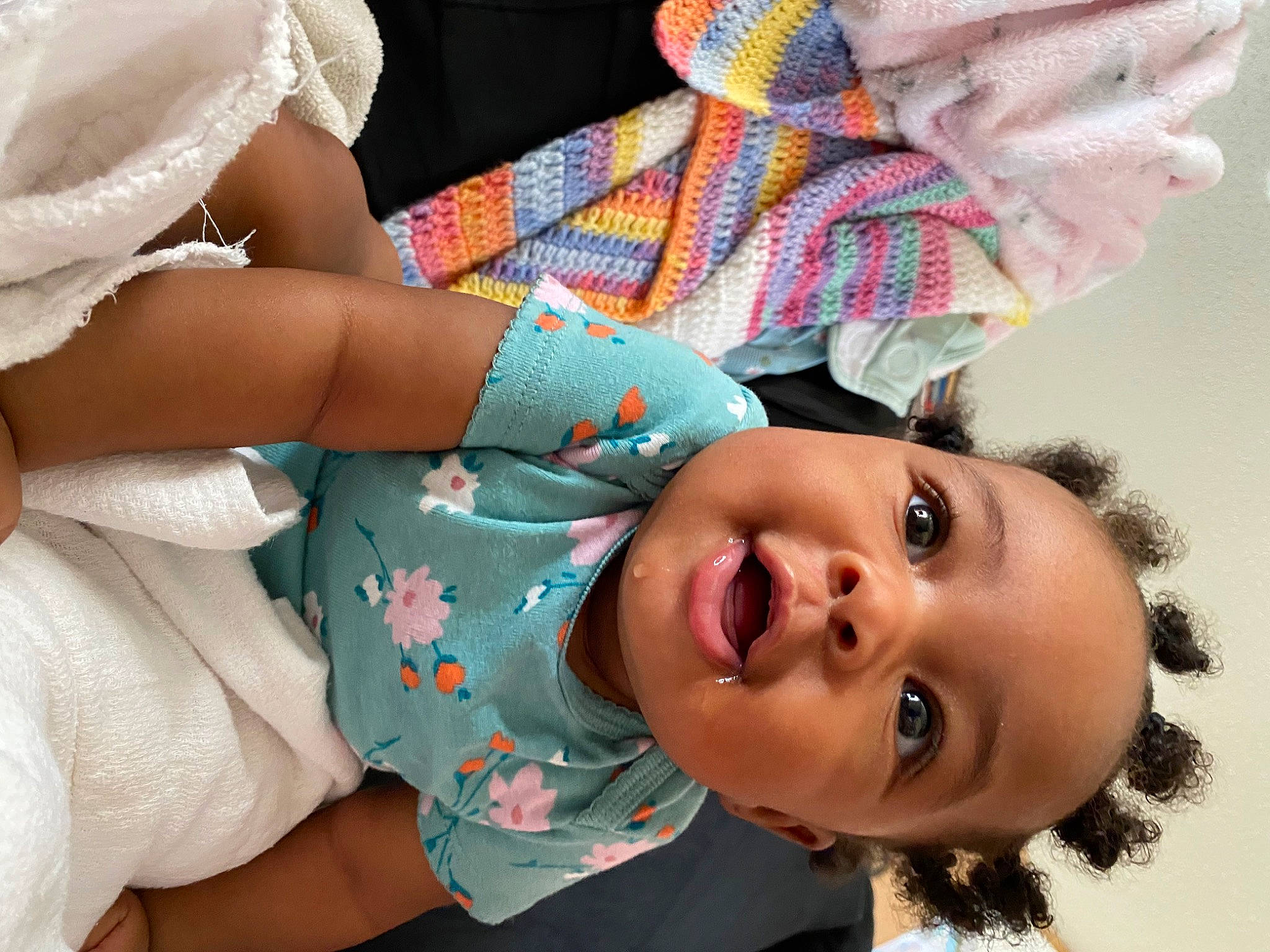 Alayna is registered to the contest to win money with this photo: baby, baby_toddler_clothing, cheek, child, eyelash, face, fashion_accessory, gesture, happy, human_body, lip, mouth, nose, organ, pattern, person, pink, skin, textile, toddler