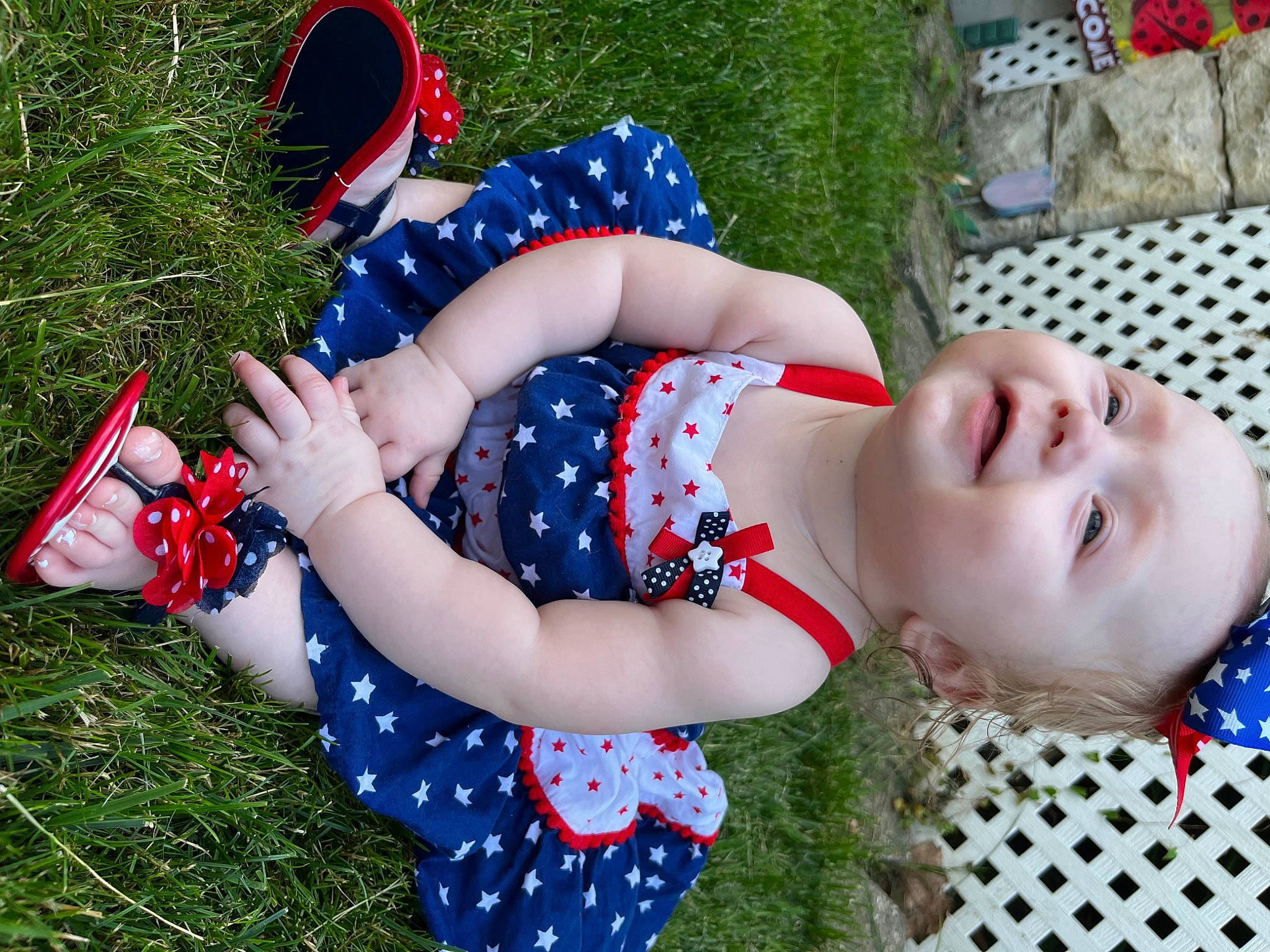 Briella joined the competition — help win amazing prizes! blue, child, dress, electric_blue, event, facial_expression, fun, grass, green, happy, human_leg, pattern, people_in_nature, person, plaid, plant, red, smile, tartan, thigh