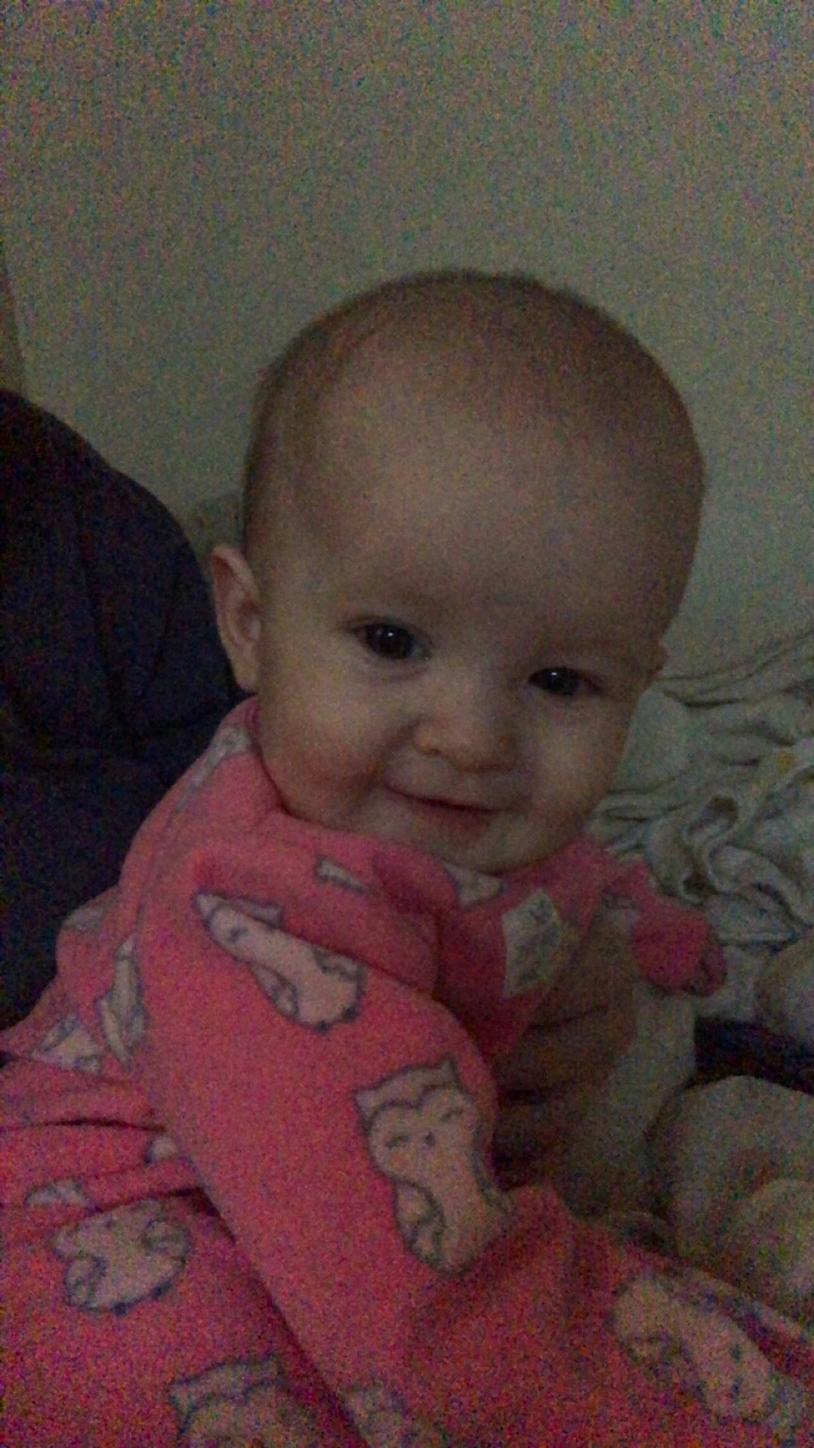 Everlee is registered to the contest to win money with this photo: baby, baby_toddler_clothing, cheek, child, chin, comfort, ear, eyebrow, flooring, iris, lip, mouth, nose, person, pink, room, skin, sleeve, smile, thumb