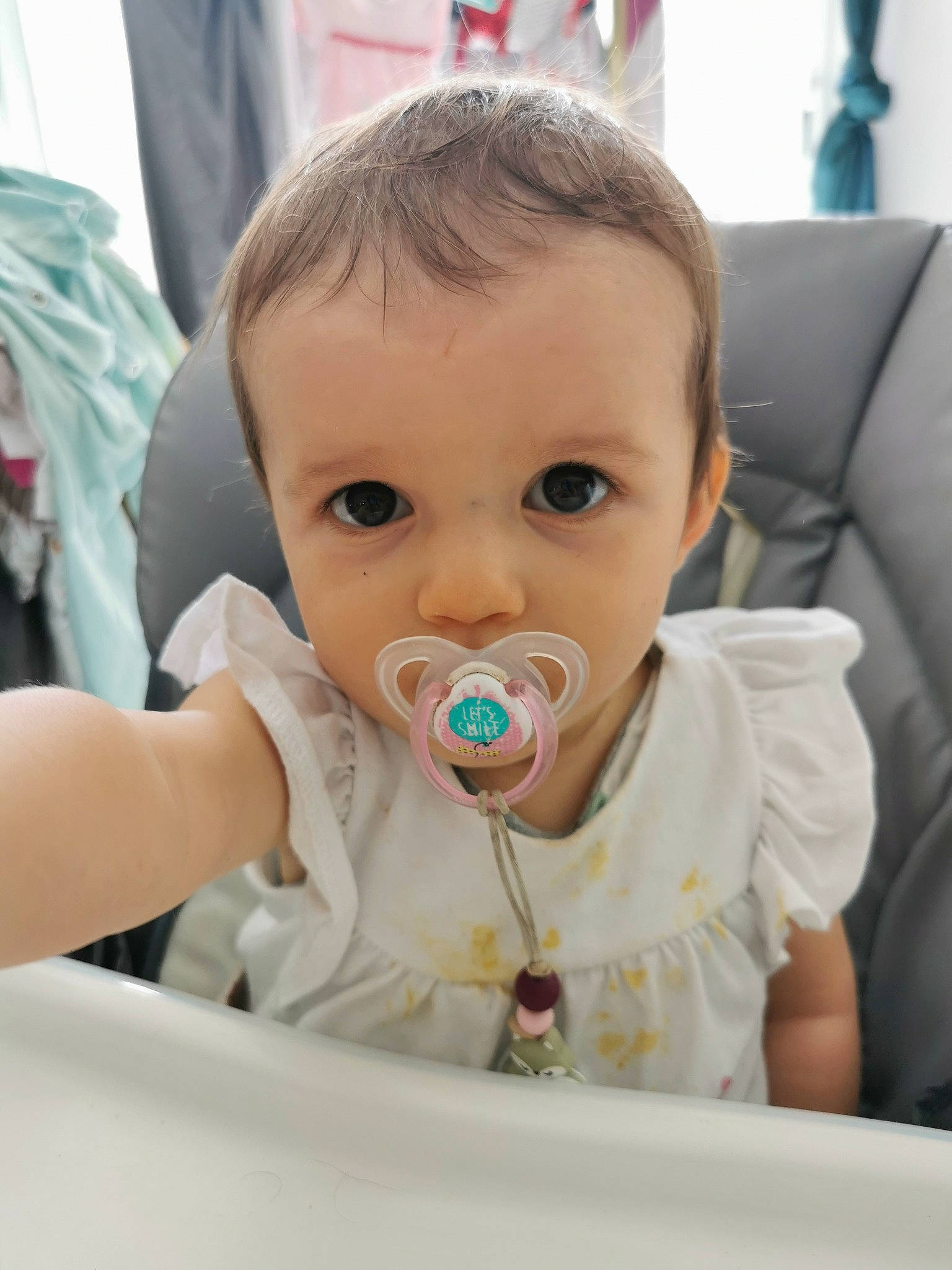 Lyséa a rejoint le concours — aidez-le/la à gagner de superbes lots ! baby, baby_products, baby_toddler_clothing, chair, cheek, child, comfort, drinkware, event, eyebrow, fun, happy, iris, lip, nose, person, room, sitting, skin, toddler