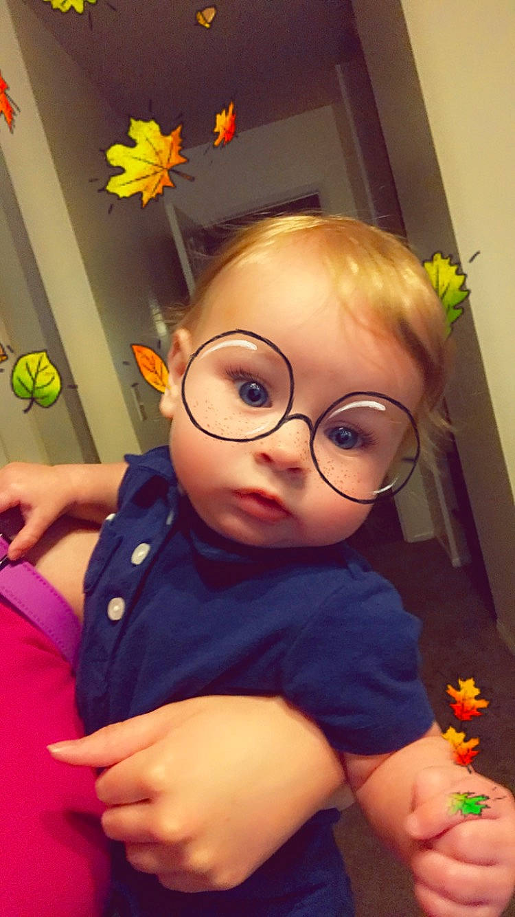 Wade joined the competition — help win amazing prizes! baby_toddler_clothing, cheek, ear, eye, eyewear, finger, fun, gesture, glasses, happy, head, iris, nose, orange, person, skin, sleeve, thumb, toy, vision_care