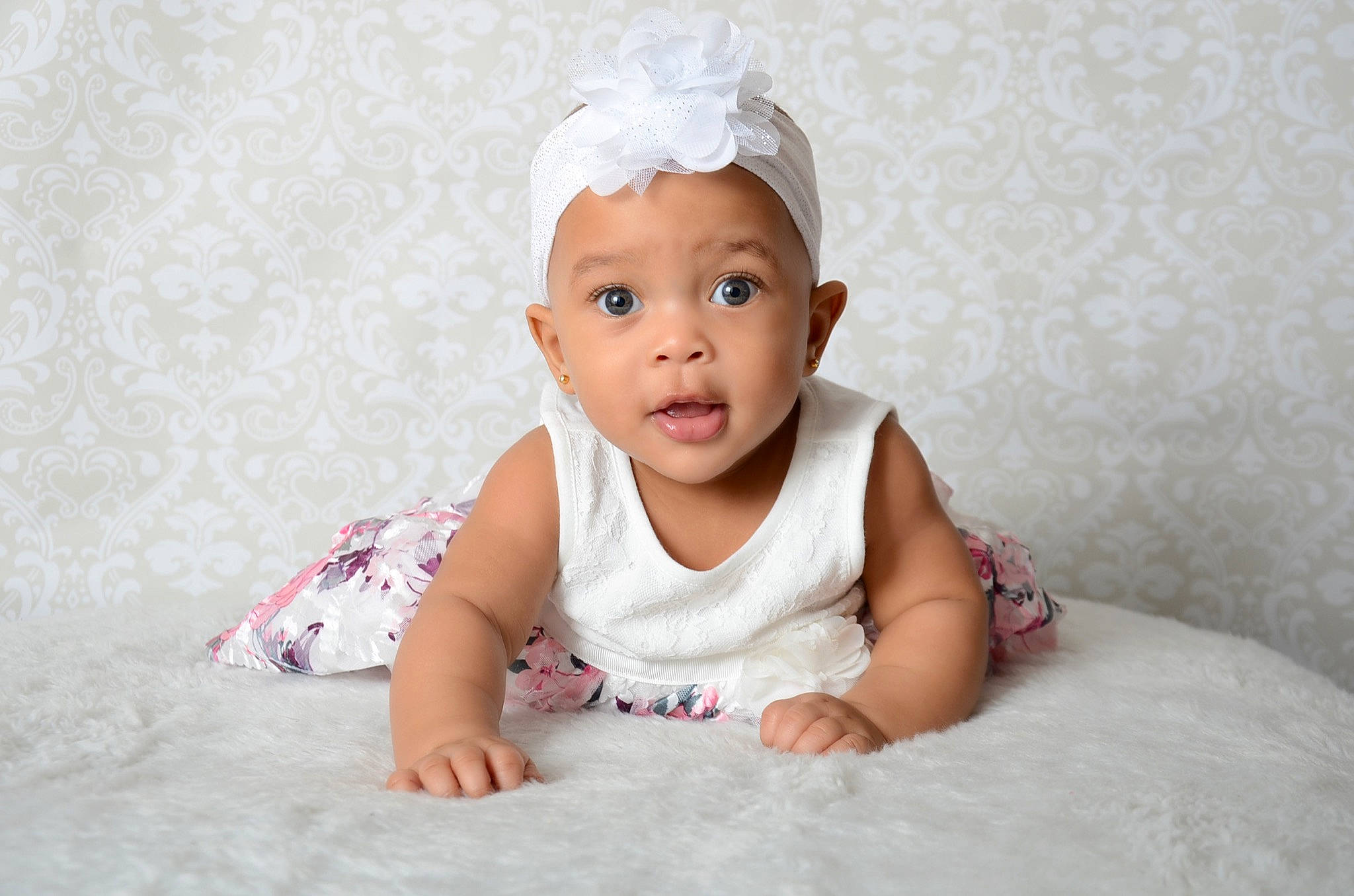 Skyla is registered to the contest to win money with this photo: baby, baby_toddler_clothing, cheek, child, comfort, dress, eye, flash_photography, fun, happy, head, headwear, iris, linens, person, pink, skin, sleeve, smile, toddler