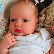 Madison joined the competition — help win amazing prizes! baby, infant, newborn, face, eyes, hand, blanket, onesie, knit_blanket, cozy, portrait, closeup, indoor, adorable, cute, cheeks, expression, heart_overlay, sparkles, soft_skin