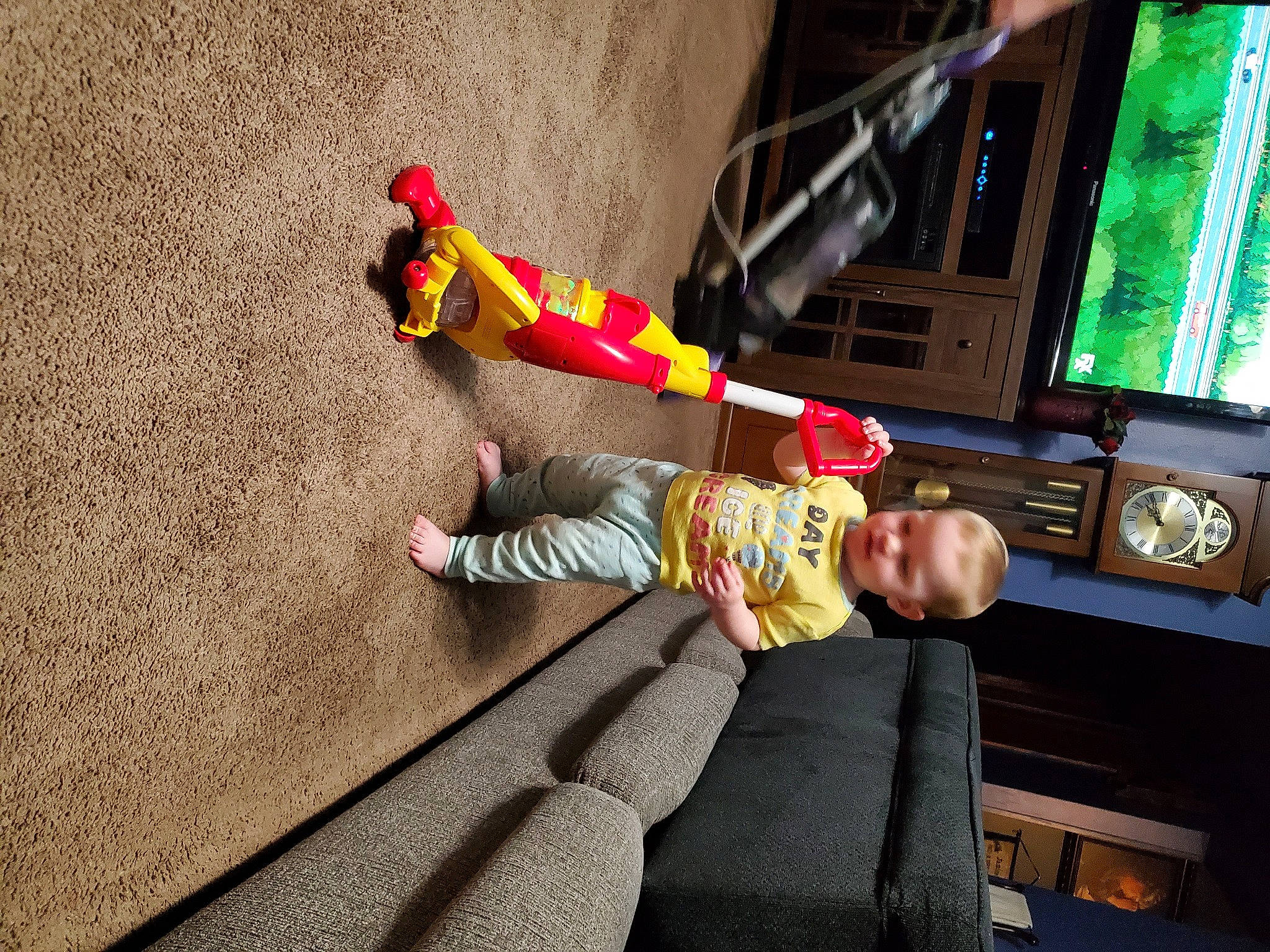 Amelia joined the competition — help win amazing prizes! baby, baby_toddler_clothing, child, comfort, display_device, flooring, fun, human_leg, knee, leg, leisure, orange, person, play, recreation, room, sock, thigh, toddler, tree