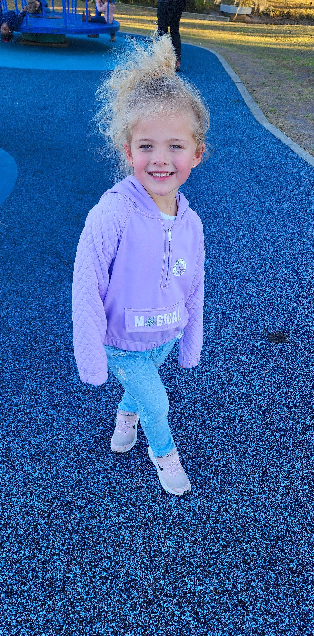 Audriella is registered to the contest to win money with this photo: asphalt, baby_toddler_clothing, blue, child, denim, electric_blue, flooring, fun, grass, happy, joy, leisure, pattern, people_in_nature, person, recreation, road_surface, sleeve, smile, tints_and_shades