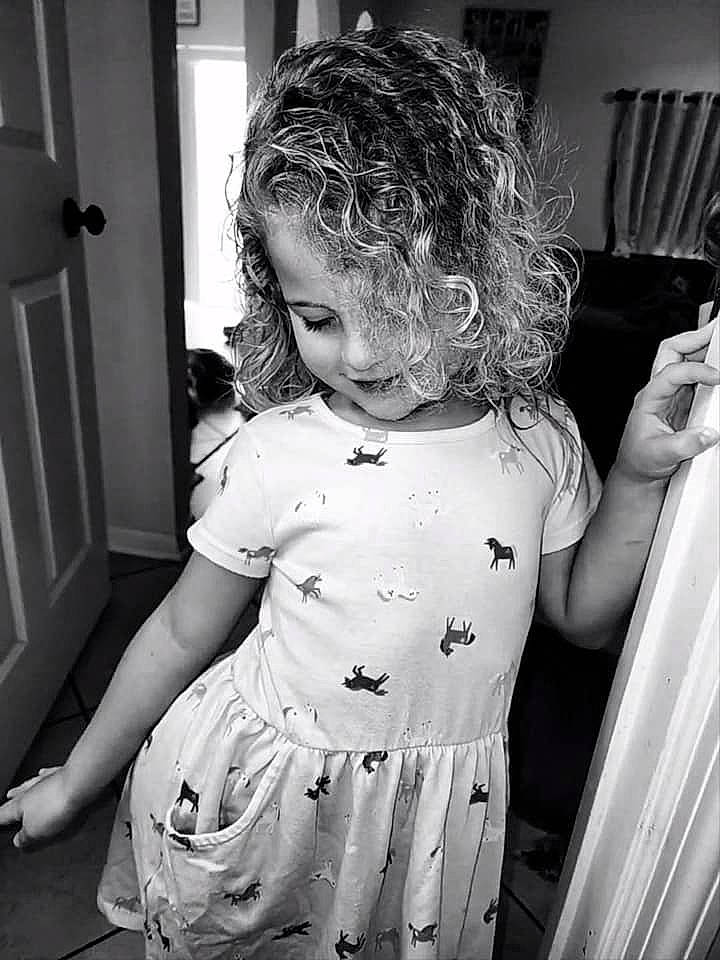Audriella is registered to the contest to win money with this photo: black, black_and_white, child, cool, door, dress, facial_expression, flash_photography, fun, gesture, hair, hairstyle, happy, human_body, monochrome, person, shoulder, standing, style, toddler