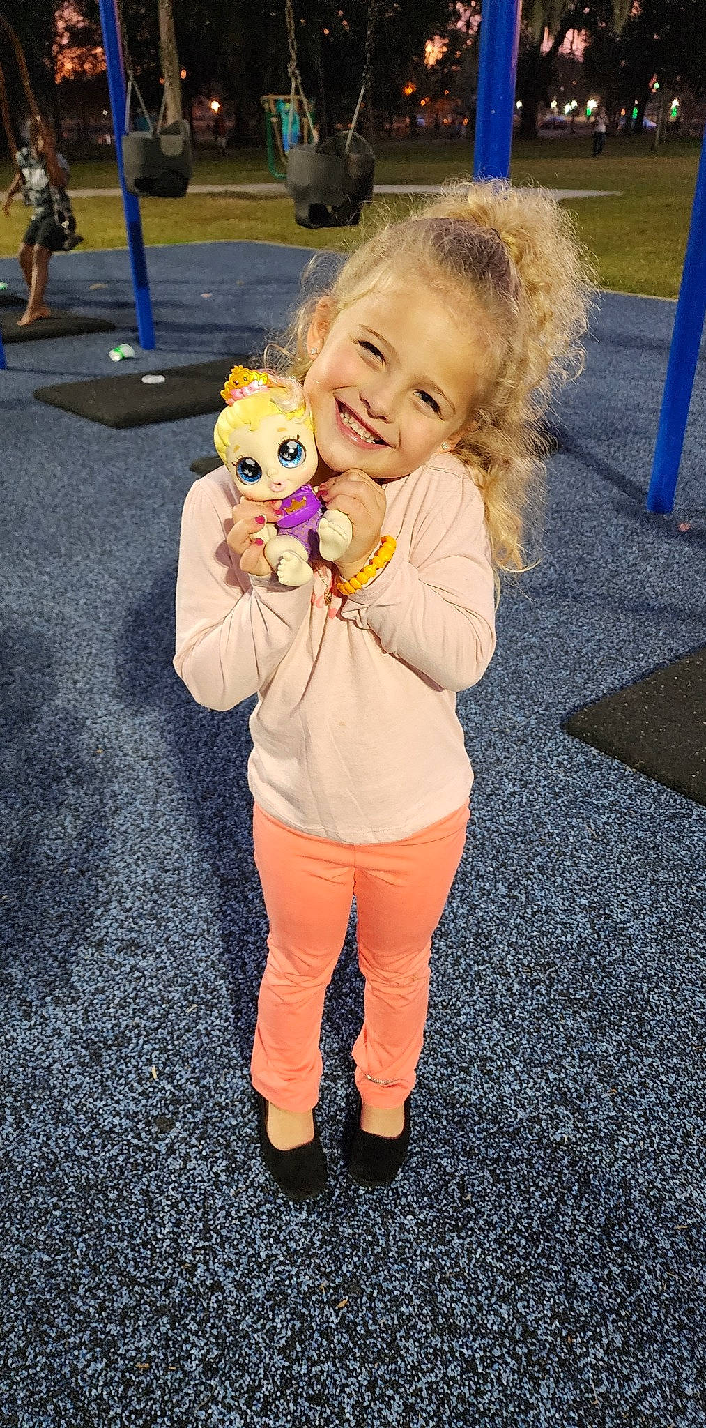 Audriella is registered to the contest to win money with this photo: asphalt, blond, child, facial_expression, flooring, fun, fur, gesture, hairstyle, happy, human_leg, joint, joy, leisure, person, play, recreation, shoe, smile, sneakers