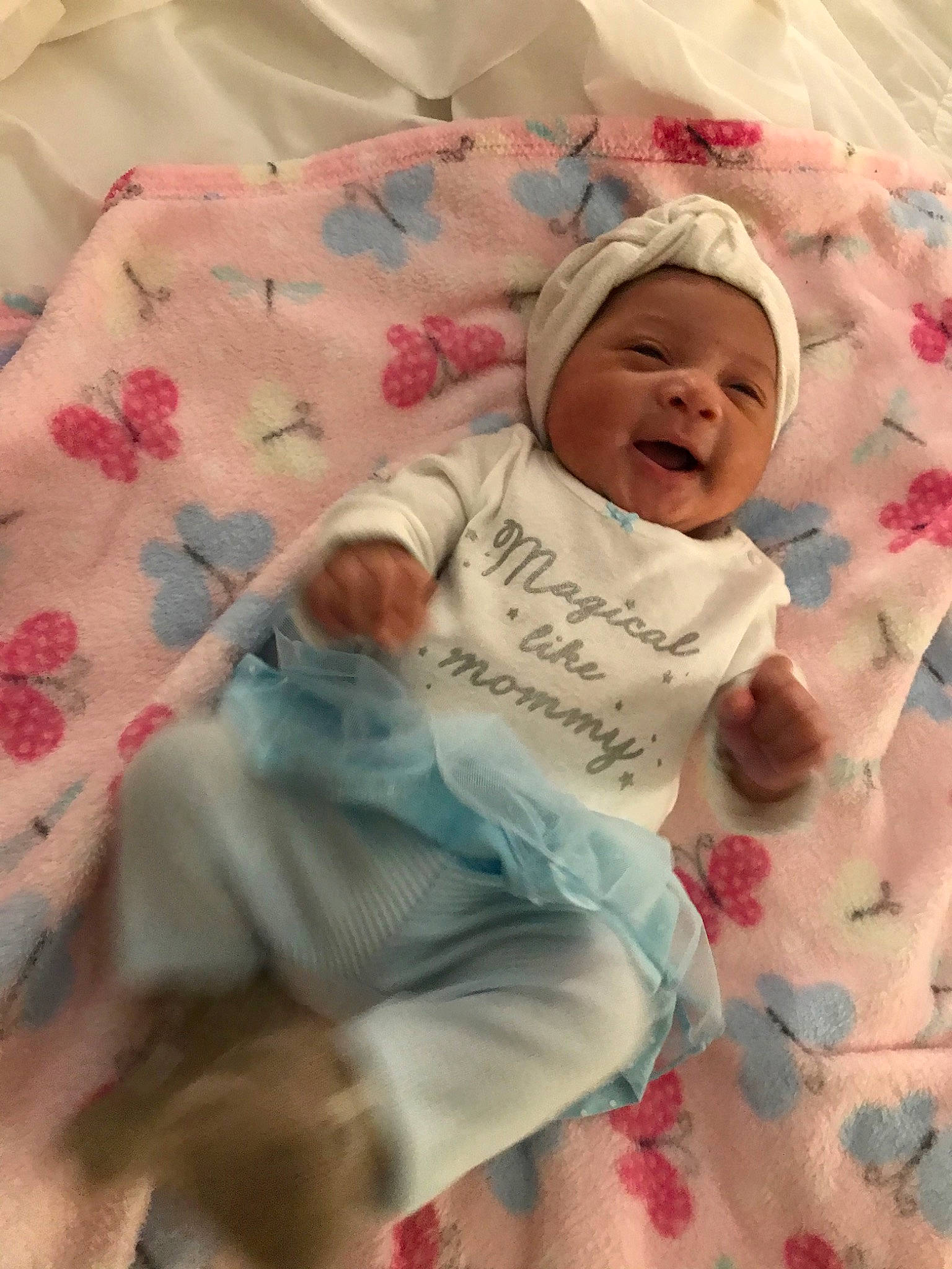 Kimora is registered to the contest to win money with this photo: baby, bedtime, birth, cheek, child, headwear, linens, nap, nap_mat, person, pink, skin, sleep, smile, textile, toddler