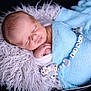 éthan participe au concours pour gagner de l'argent avec cette photo : baby, blanket, blue, child, closeup, cute, face, fluffy_cushion, hand, indoor, infant, newborn, nursery, pacifier_clip, peaceful, portrait, resting, sleeping, soft_texture, wrapped