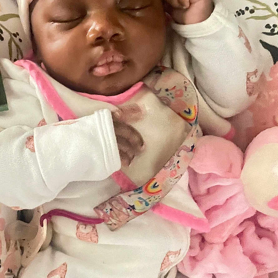 Blessyn Wingba is registered to the contest to win money with this photo: baby, blanket, child, closeup, comfort, cozy, cute, headband, indoor, infant, newborn, pajamas, peaceful, pink, plush_toy, portrait, resting, sleeping, soft, white_clothing