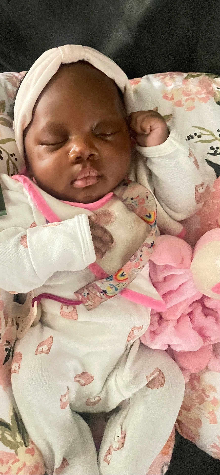 Blessyn Wingba is registered to the contest to win money with this photo: baby, sleeping, pajamas, headband, blanket, plush_toy, infant, cute, peaceful, cozy, pink, white_clothing, child, closeup, portrait, soft, indoor, resting, newborn, comfort