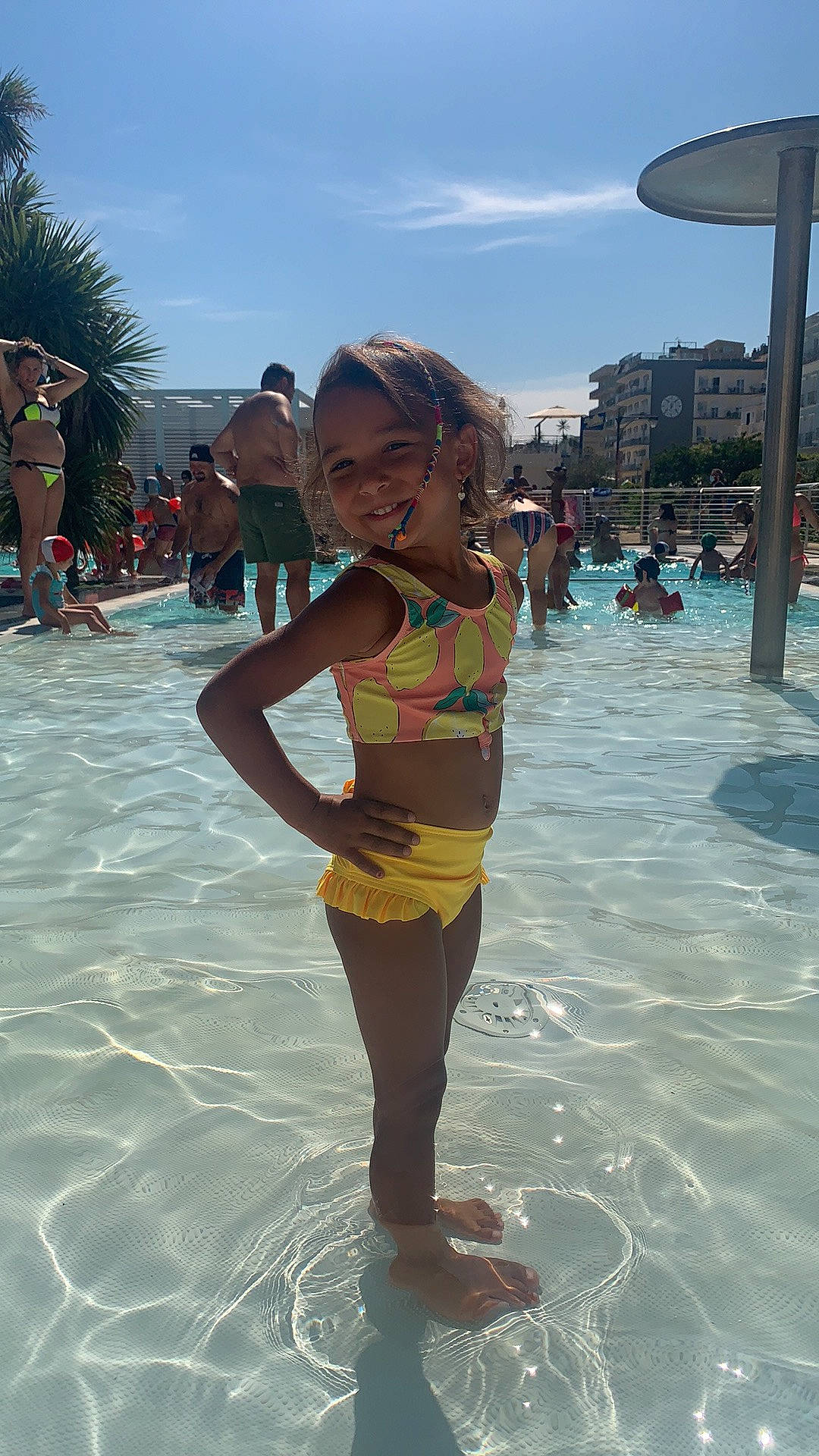 Liana participe au concours pour gagner de l'argent avec cette photo : bathing, beach, beauty, body_of_water, brassiere, cloud, fun, happy, joy, leisure, one_piece_swimsuit, people_on_beach, person, photograph, recreation, sky, smile, summer, swimwear, thigh