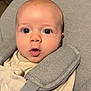 Nelson a rejoint le concours — aidez-le/la à gagner de superbes lots ! baby, infant, face, expression, wide_eyes, seat, straps, clothing, beige, gray, indoor, portrait, child, cute, young, person, closeup, soft_texture, comfort, curious
