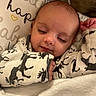 Charlie is registered to the contest to win money with this photo: baby, sleeping, blanket, pillow, soft, cozy, infant, cute, peaceful, animal_prints, clothing, face, head, resting, comfort, indoors, child, portrait, warm, toddler