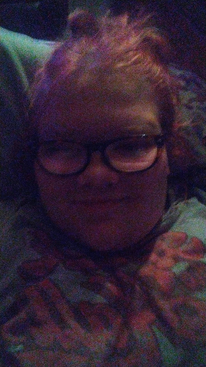 Emmie is registered to the contest to win money with this photo: cheek, cool, electric_blue, eyebrow, eyewear, facial_hair, flesh, forehead, fun, glasses, jaw, magenta, mouth, nose, pattern, person, portrait, selfie, smile, tints_and_shades