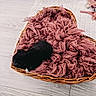 puppy, black_dog, basket, heart_shaped, blanket, fluffy, wooden_floor, sleeping, pet, cozy, indoor, cute, small_dog, wicker, fur, animal, resting, soft_texture, pink_blanket, home