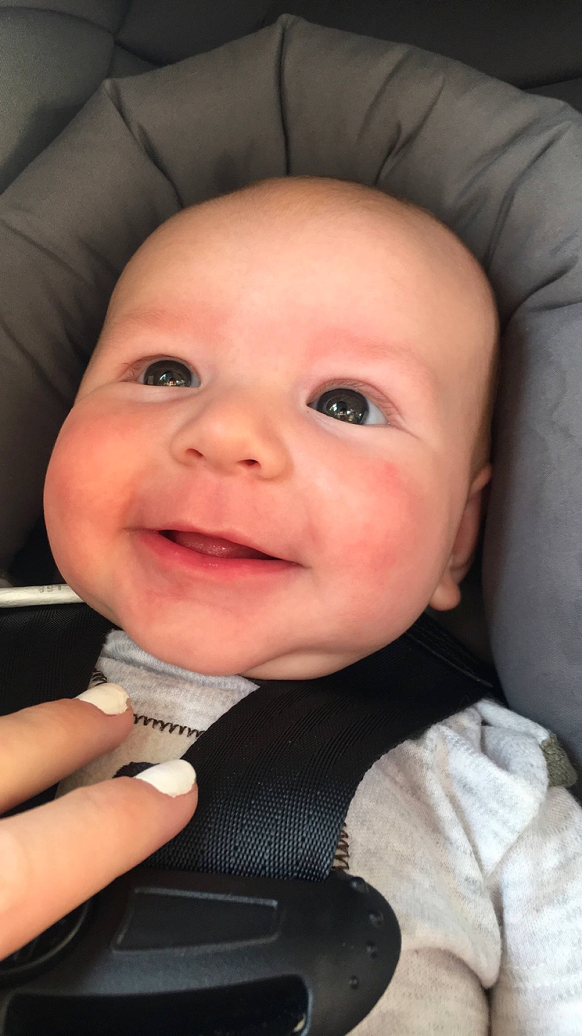 Kolby is registered to the contest to win money with this photo: baby, baby_in_car_seat, car_seat, cheek, child, chin, eye, face, facial_expression, forehead, head, joy, lip, mouth, nose, person, skin, smile, toddler