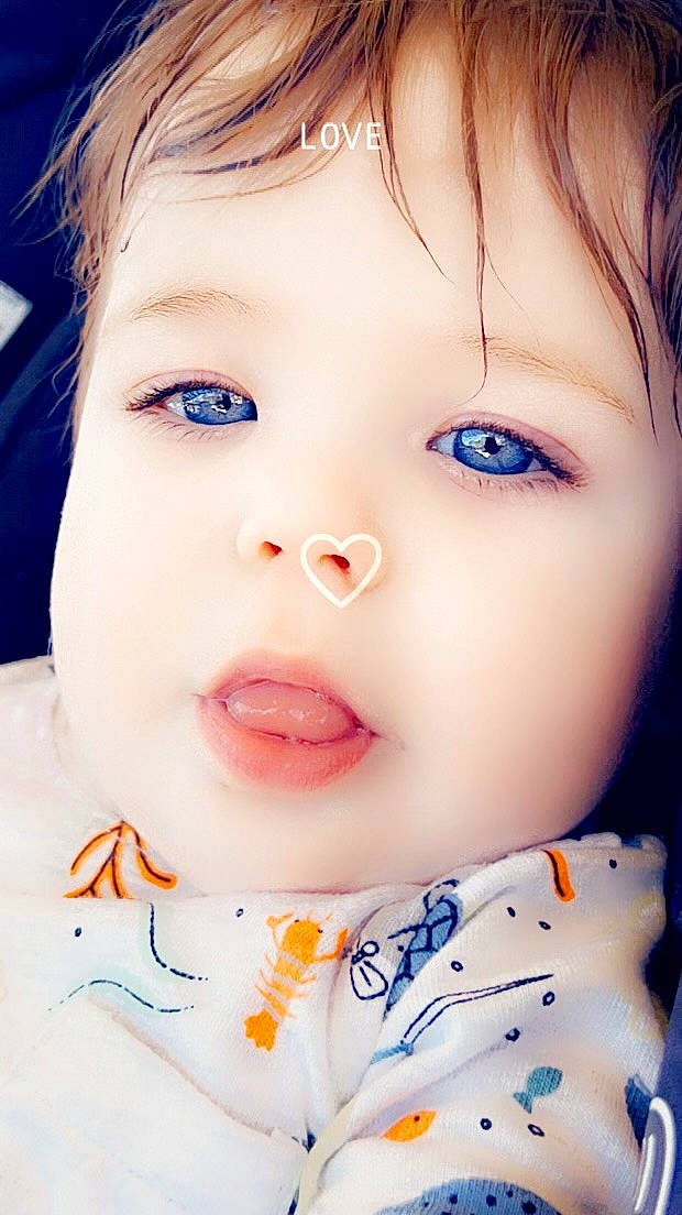 Daxton is registered to the contest to win money with this photo: cheek, chin, dress, ear, eye, eyebrow, eyelash, face, facial_expression, forehead, hairstyle, human, iris, lip, mouth, neck, nose, person, skin, sleeve