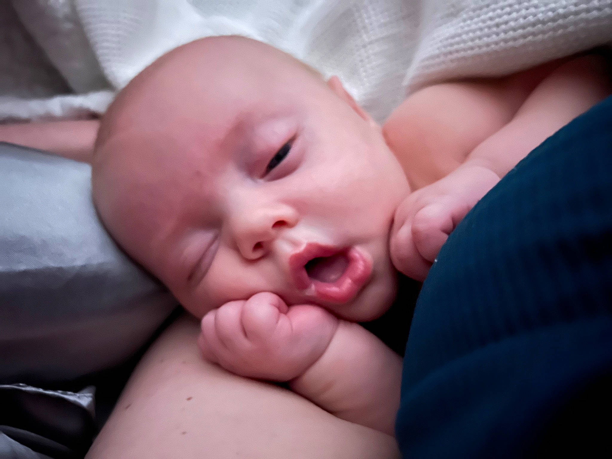 Zeppelin is registered to the contest to win money with this photo: baby, cheek, child, chin, close_up, comfort, event, eyelash, finger, flesh, gesture, hand, happy, lip, mouth, nail, nose, person, skin, thumb