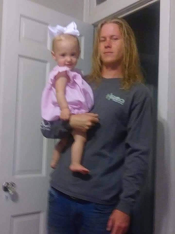 Ansleigh is registered to the contest to win money with this photo: abdomen, arm, baby, blond, blurred, child, ear, eye, finger, head, joint, long_hair, person, photography, shoulder, standing, t_shirt, toddler, trunk