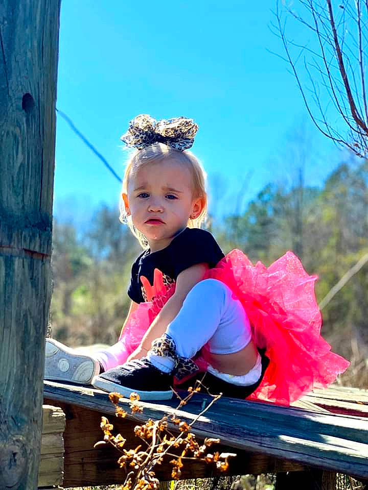 Ansleigh is registered to the contest to win money with this photo: child, child_model, costume, fawn, fun, happy, leisure, person, photography, pink, plant, play, playground, recreation, smile, toddler, tree