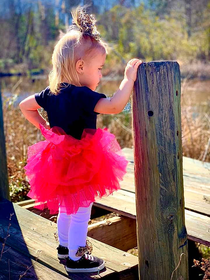 Ansleigh is registered to the contest to win money with this photo: baby_toddler_clothing, ballet_tutu, blond, child, child_model, clothing, costume, dress, footwear, magenta, person, photo_shoot, photography, pink, red, shoe, toddler
