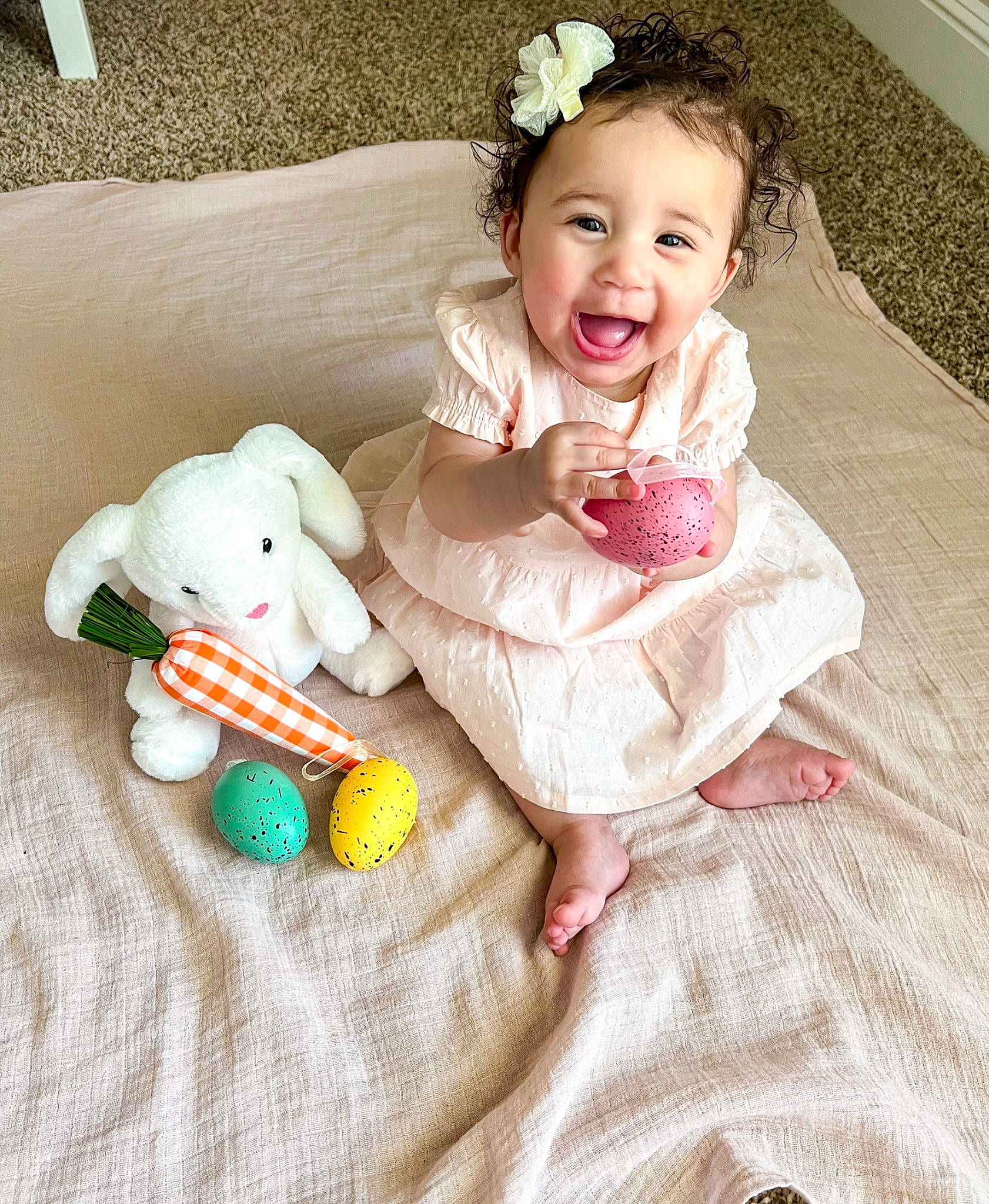 Gemma is registered to the contest to win money with this photo: baby_toddler_clothing, bridal_accessory, child, dress, embellishment, eye, fashion_accessory, flash_photography, happy, head, headpiece, pattern, person, pink, skin, sleeve, smile, stuffed_toy, textile, toddler