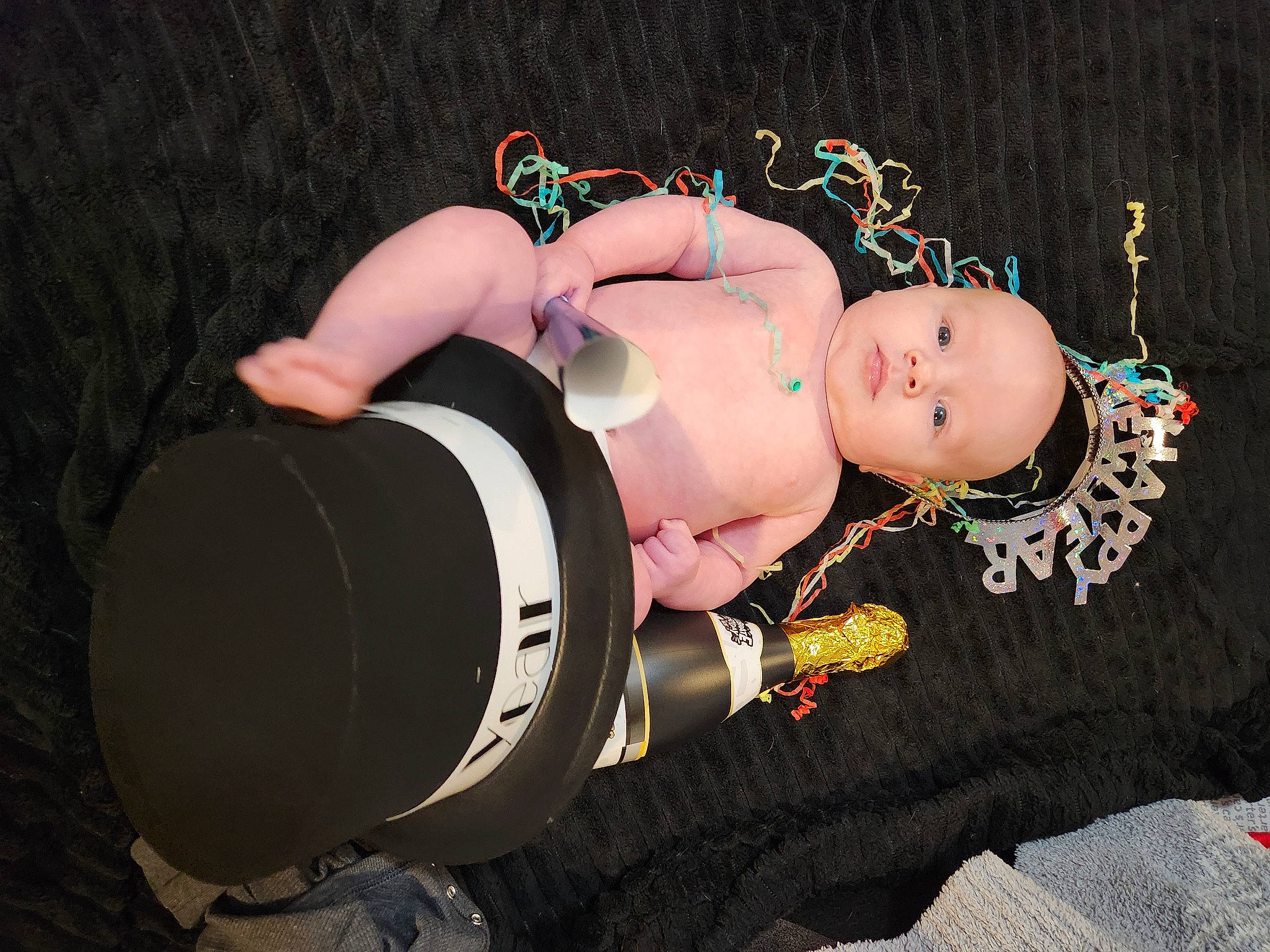 Phoenix is registered to the contest to win money with this photo: animation, arm, baby, baby_products, baby_toddler_clothing, baby_toys, chest, elbow, fashion_accessory, flash_photography, hand, headgear, human_body, human_leg, person, personal_protective_equipment, sitting, thigh, toddler, toy