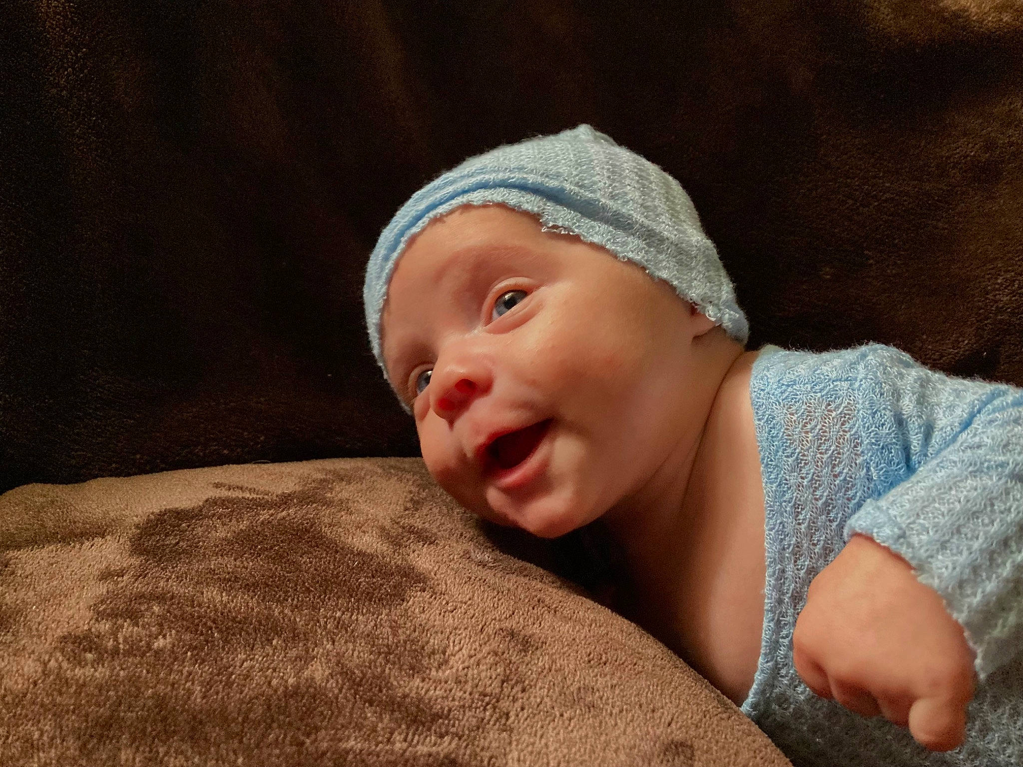 Kash is registered to the contest to win money with this photo: baby, baby_toddler_clothing, cap, cheek, comfort, eye, face, flash_photography, fun, grass, hat, headgear, linens, lip, nose, person, sitting, sleeve, toddler, wood