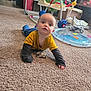 Grayson is registered to the contest to win money with this photo: baby, child, carpet, indoor, toy, playtime, floor, curious, yellow_shirt, crawling, carpeted_floor, infant, colorful_toys, household_items, long_sleeves, person, young_child, indoors, childhood, baby_toys
