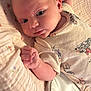 Cataleya joined the competition — help win amazing prizes! baby, infant, onesie, blanket, cute, face, hand, soft, pattern, cartoon, sleepwear, newborn, child, portrait, skin, expression, lying_down, indoor, young, curious