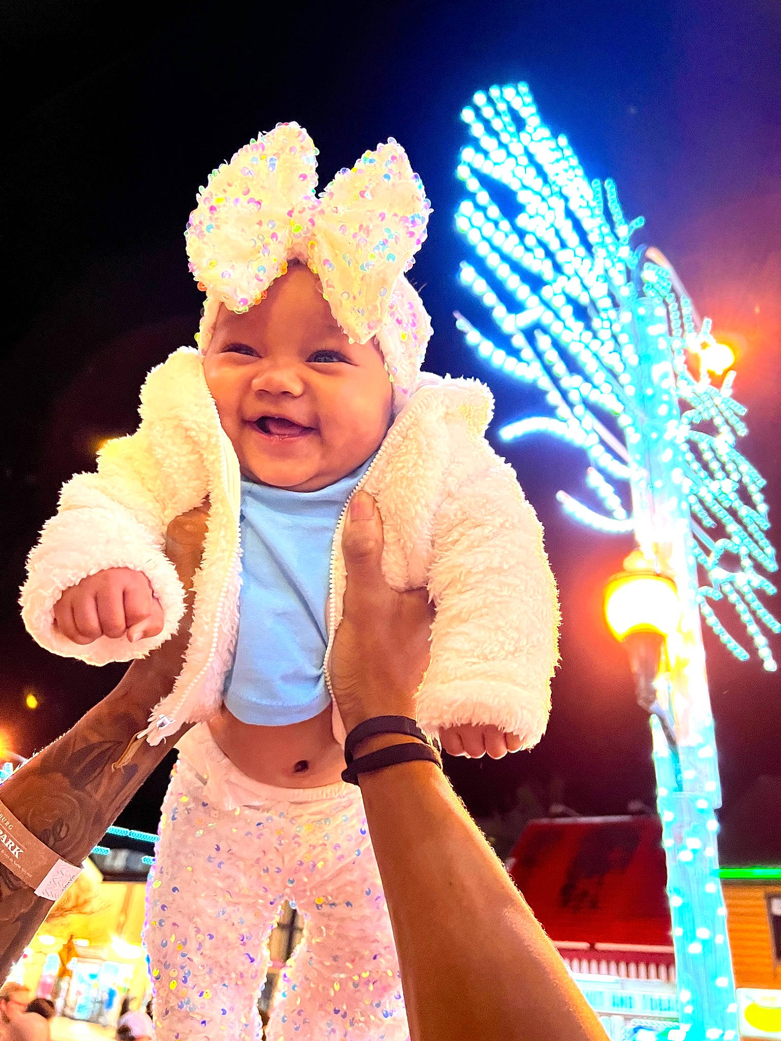 Maeva joined the competition — help win amazing prizes! baby, beauty, entertainment, event, finger, fun, gesture, happy, hat, headwear, holiday, human, human_body, party_supply, performance_art, performing_arts, person, pink, smile, thumb