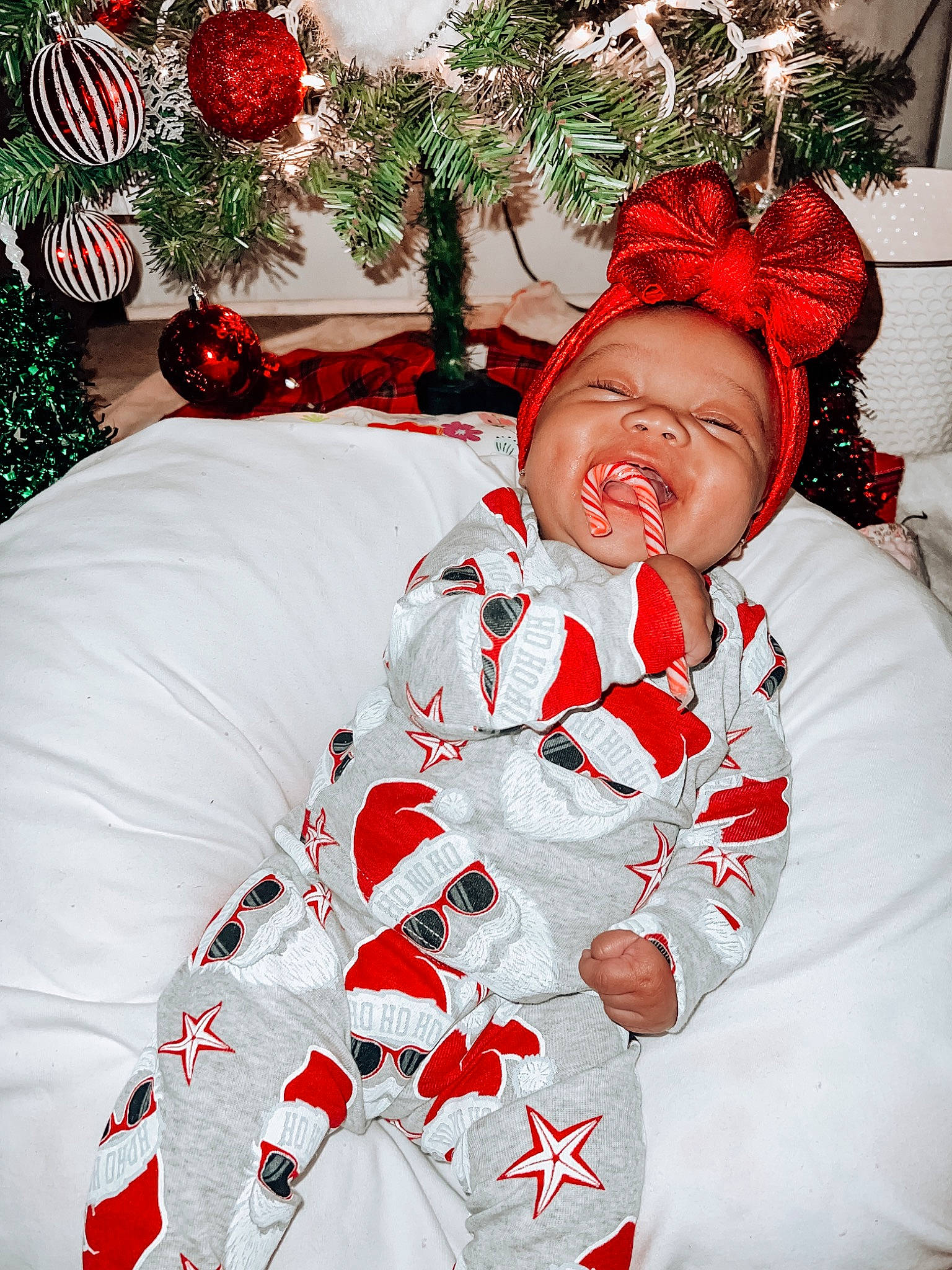 Maeva joined the competition — help win amazing prizes! carmine, christmas, christmas_decoration, christmas_eve, christmas_ornament, event, face, fictional_character, flesh, happy, head, holiday, holiday_ornament, interior_design, ornament, pattern, person, red, sleeve, tradition