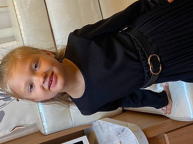 Jalane participe au concours pour gagner de l'argent avec cette photo : baby, baby_toddler_clothing, blazer, child, comfort, flooring, happy, joy, person, room, sitting, sleeve, smile, suit, table, toddler, wood