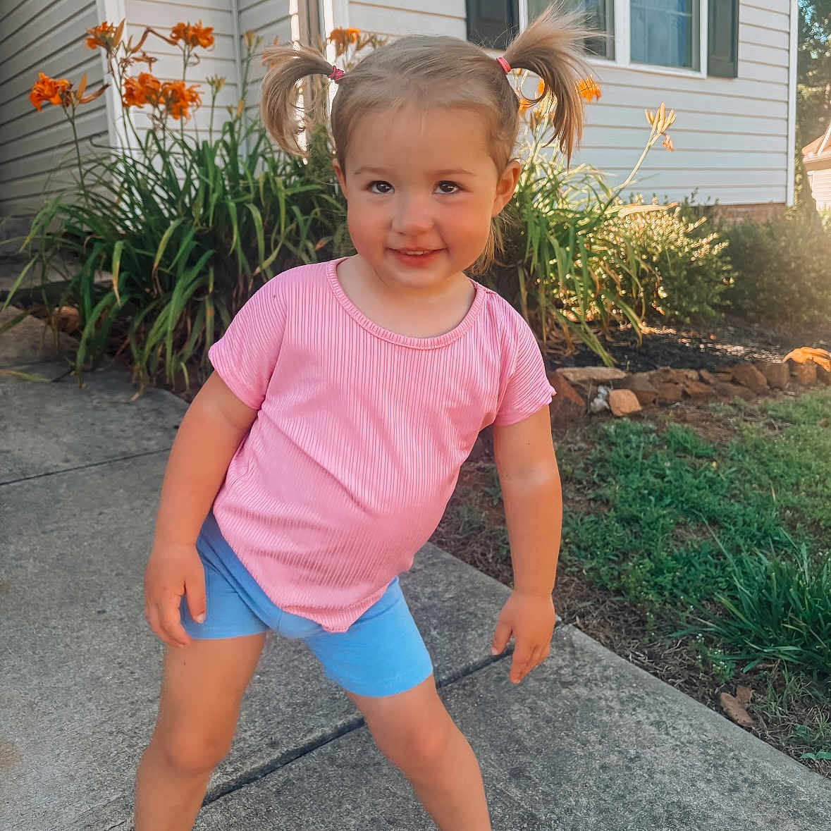 Gracelynn joined the competition — help win amazing prizes! backyard, child, clothing, face, female, girl, head, jar, nature, outdoors, person, photography, plant, portrait, pottedplant, shorts, slate, summer, t_shirt, yard