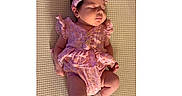 Vivianna joined the competition — help win amazing prizes! baby, infant, sleeping, pink_outfit, headband, socks, floral_pattern, cute, peaceful, lying_down, soft_lighting, indoors, portrait, adorable, child, small_hands, small_feet, textured_background, resting, young