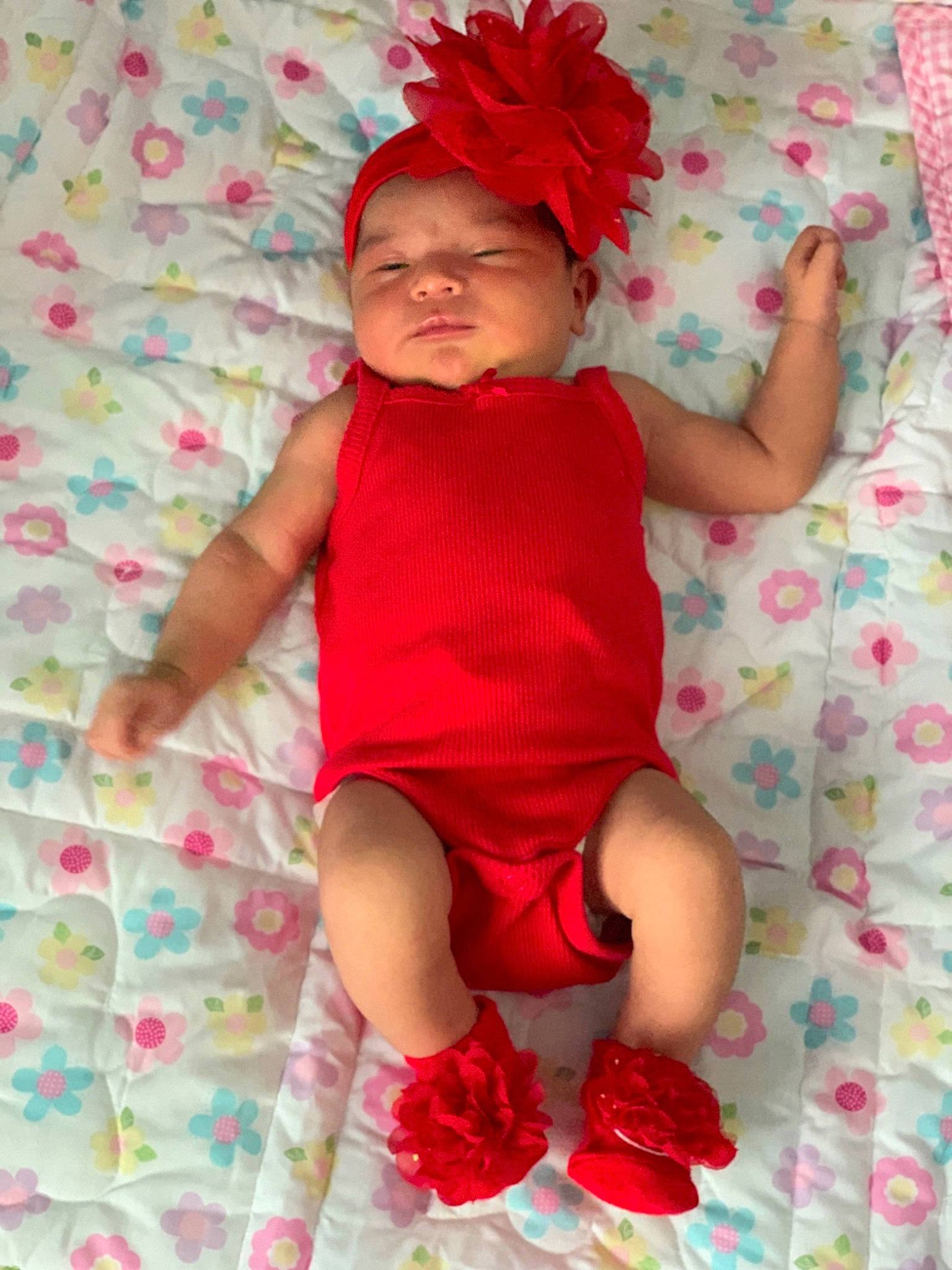 Aileen is registered to the contest to win money with this photo: baby, baby_products, baby_toddler_clothing, child, fun, headwear, leg, pattern, person, pink, play, product, red, smile, textile, thigh, toddler