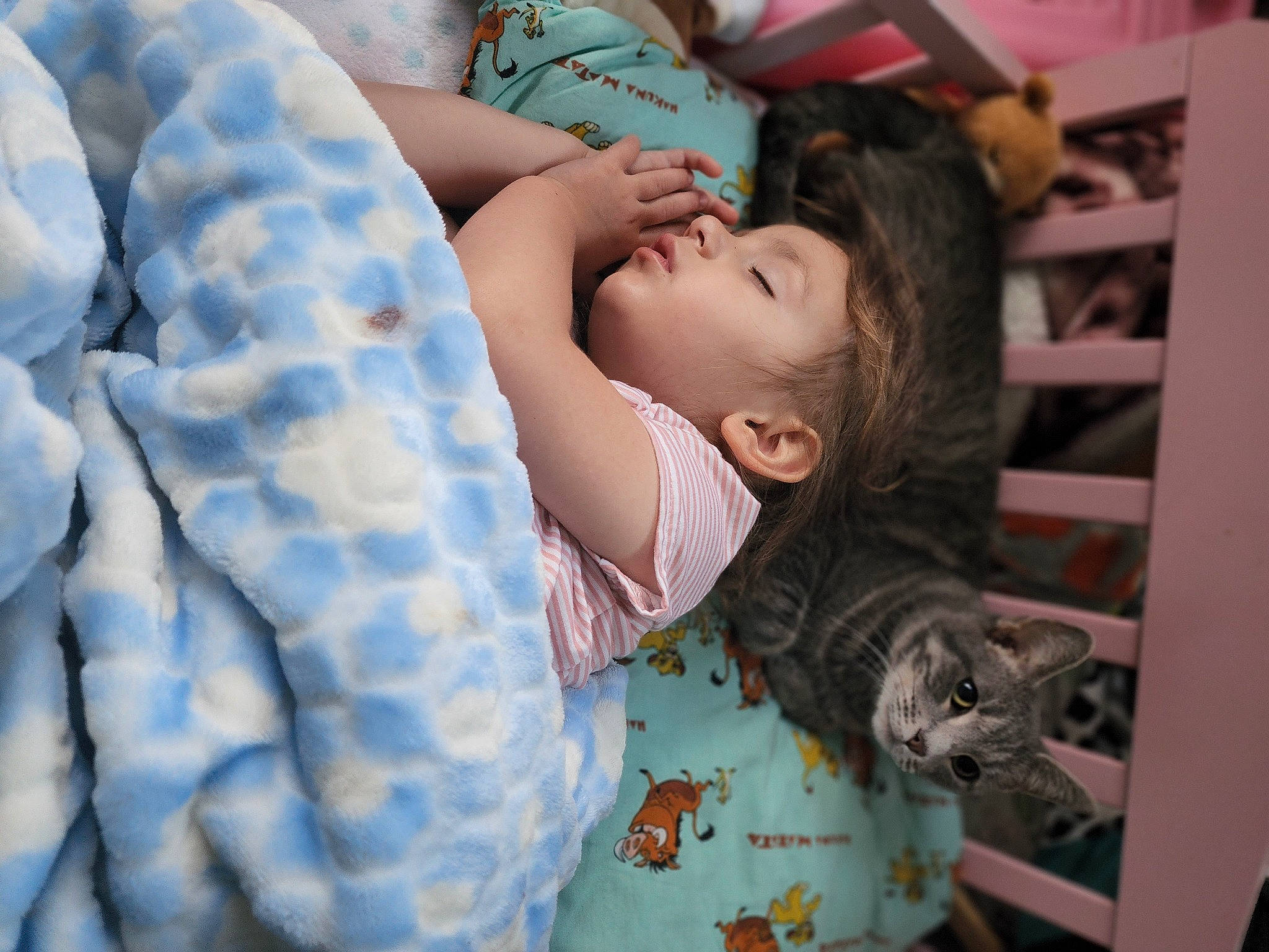 Laya is registered to the contest to win money with this photo: baby, baby_products, bed, bedding, bedtime, child, comfort, fun, happy, linens, mouth, nap, pattern, portrait_photography, room, sitting, sleep, sleeve, textile, toddler