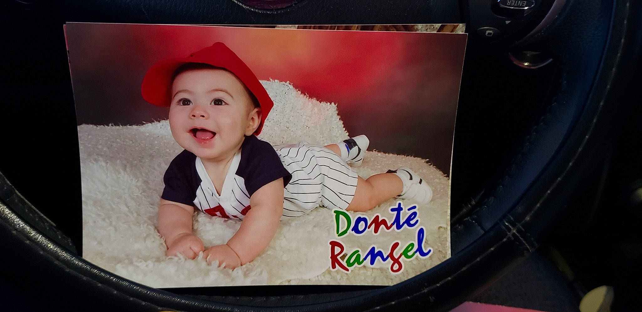 Donte' is registered to the contest to win money with this photo: baby, cheek, child, electronic_device, fun, person, photography, product, skin, smile, toddler