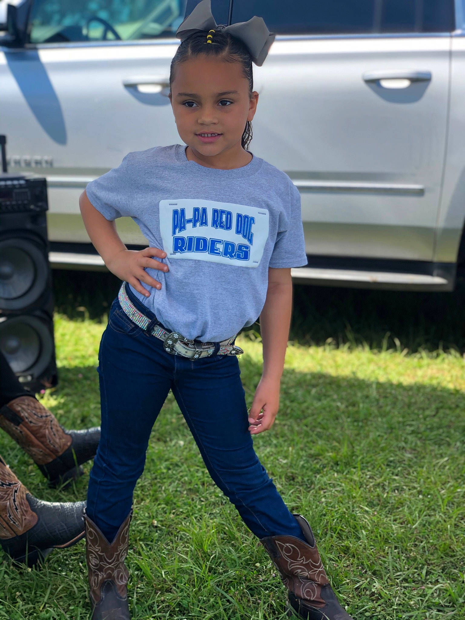 Cassidy joined the competition — help win amazing prizes! automotive_design, automotive_exterior, automotive_tire, bumper, car, electric_blue, family_car, grass, joy, motor_vehicle, parking, person, shoe, sneakers, sportswear, street_fashion, t_shirt, toddler, trunk, vehicle