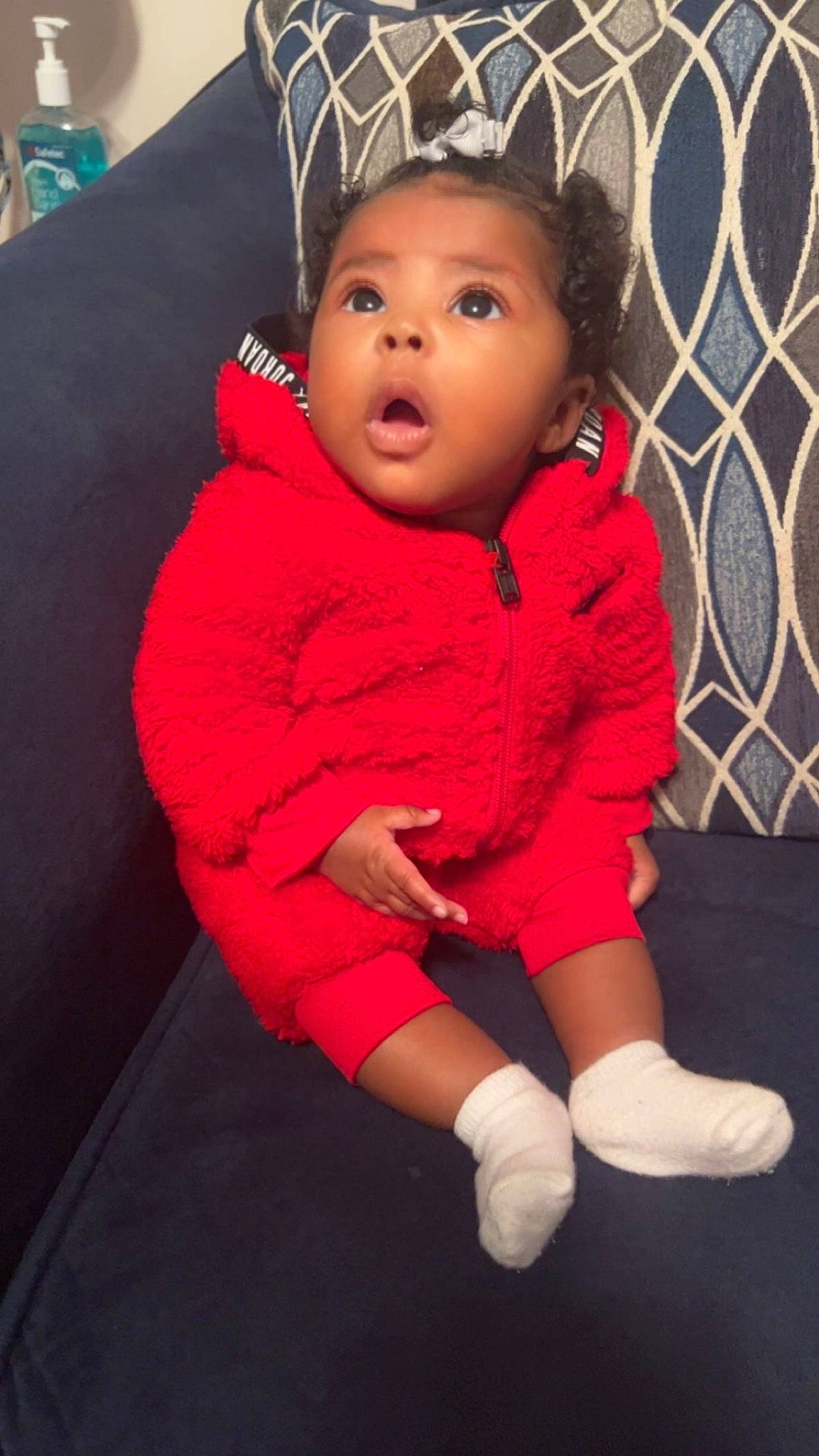 Sa Niyah is registered to the contest to win money with this photo: arm, baby, baby_toddler_clothing, cheek, child, comfort, cool, eye, face, facial_expression, flash_photography, flooring, fun, happy, head, magenta, mesh, person, skin, sleeve